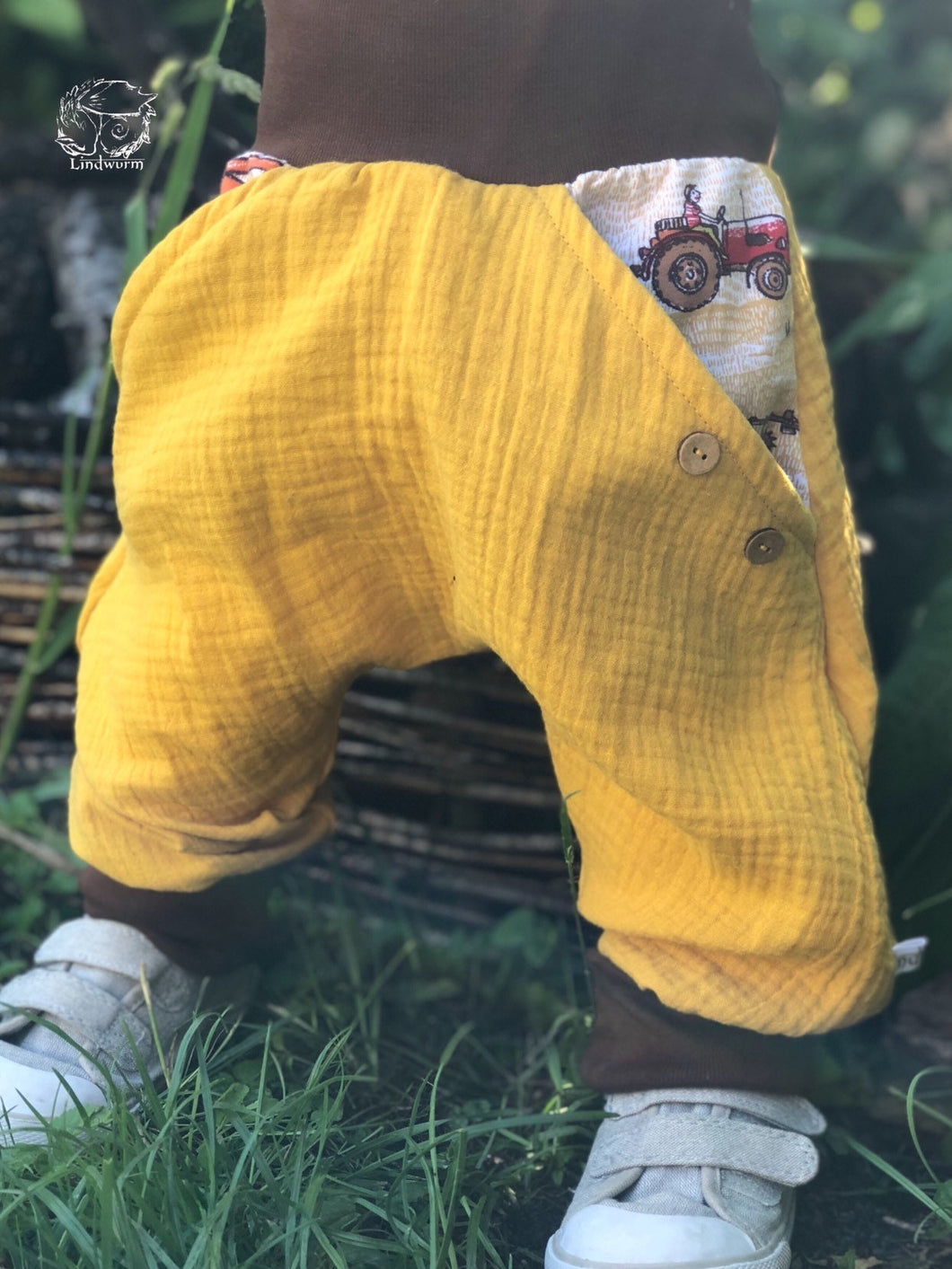 MUSSELIN-HOSE SENFGELB TRAKTOR